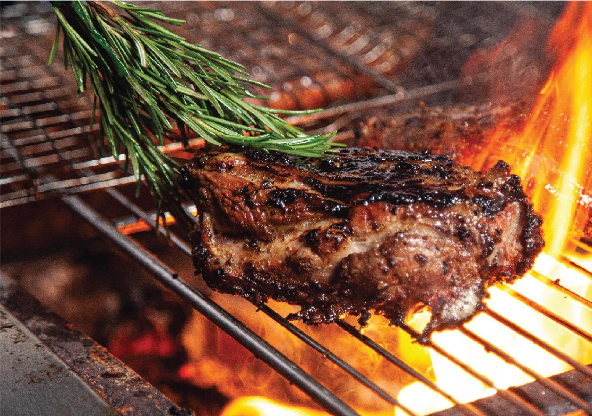 Jumeirah Messilah Beach Kuwait Kuwait City ภายนอก รูปภาพ A steak being grilled