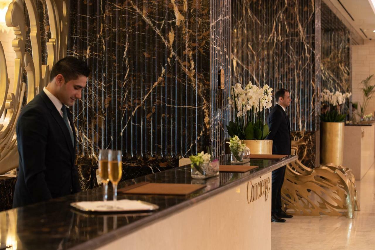 Jumeirah Messilah Beach Kuwait Kuwait City ภายนอก รูปภาพ Concierge at the Four Seasons Hotel, London